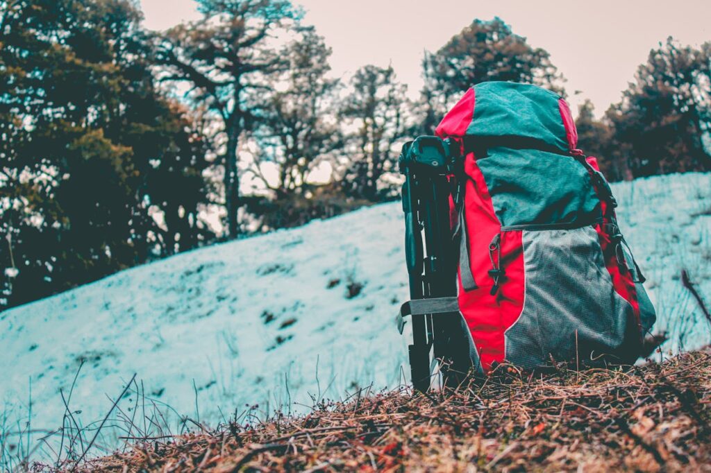 Crafting Captivating Headlines: Your awesome post title goes here A vibrant backpack rests on a snowy trail in Shimla. Perfect for adventure and nature enthusiasts.